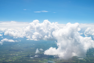 Naklejka na ściany i meble View from air plane window, Over the cloud