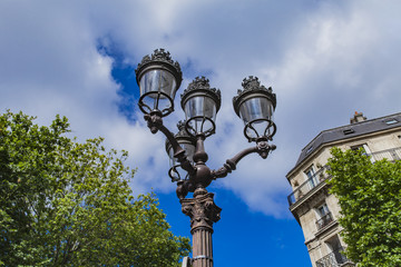 Fototapeta na wymiar Street lights by Hotel de Ville (City Hall) in Paris