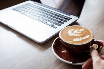 Cup of coffee on table, coffee cafe shop.