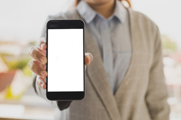 Business woman holding phone show product and statistics sale this Quarter demand supply white isolated