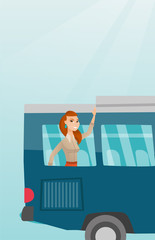 Young caucasian woman enjoying her trip by bus. Happy passenger waving hand from bus window. Cheerful tourist peeking out of bus window and waving hand. Vector cartoon illustration. Vertical layout.