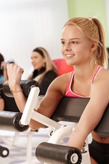 Young woman working out at the gym