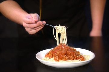 Close Up hands chef cooking raw material in the kitchen