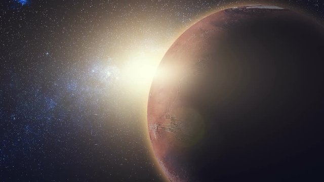 Sunrise view on Mars in sun beams from space. Red Planet close up rotate, spinning on its axis in black Universe of stars. High detail 4k. 3D Render animation. Elements of this image furnished by NASA