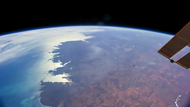 International Space Station (ISS) view of cloudy rotating planet earth. Created from Public Domain images, courtesy of NASA Johnson Space Center : http://eol.jsc.nasa.gov. 