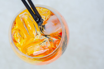 Spritz Aperol cocktail in wine glass, orange cocktail with ice