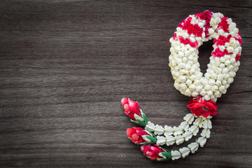 nice jasmine garland on wood background