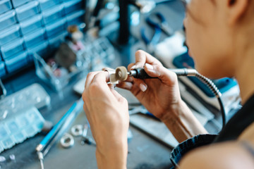 The girl is engaged in jewelry business