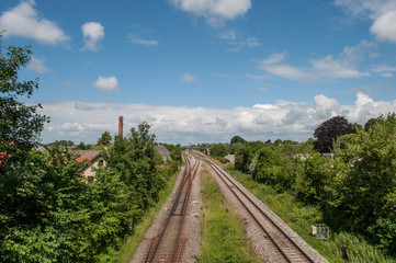 Fototapeta na wymiar Railway through the Danish town of Lundby