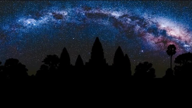Angkor Wat at night with amazing Milky Way in the background. Siem Reap, Cambodia. Slow motion 4K footage