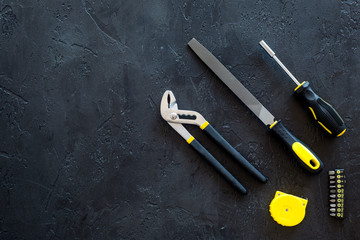 house renovation with implements set for building, painting and repair black table background top view mockup