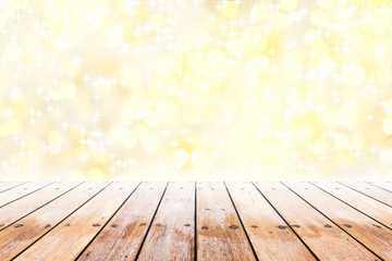 Naklejka na ściany i meble Empty wooden table with shining stars and golden bokeh background blurred. Concept celebration, happy, romantic, gift, valentines