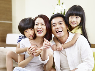 portrait of happy asian family, happy and laughing. 