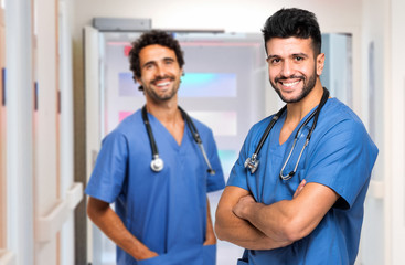 Two male nurses smiling