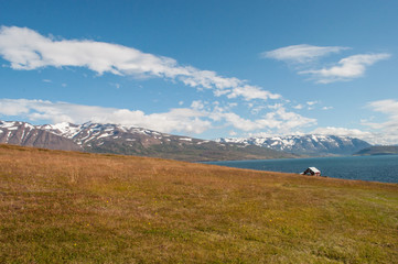 mountain view from island of Hrisey in Iceland