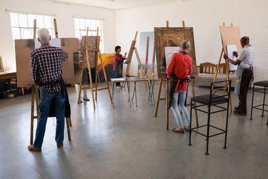 Senior People Painting In Art Studio