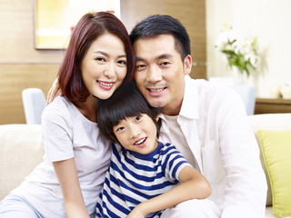 Fototapeta na wymiar portrait of happy asian family, mother, father and son
