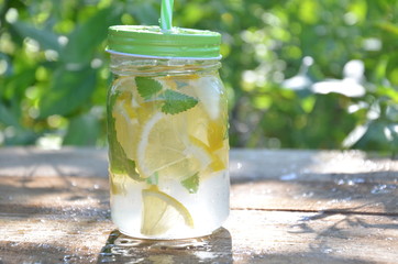 Lemon mojito cocktail with mint lemonade, cold refreshing drink or beverage, ice