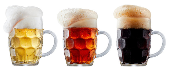 Mug collection of frosty dark red and light beer with foam isolated on a white background