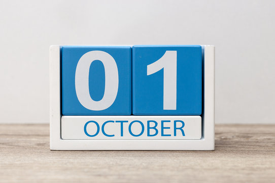 October 1st . October 1 white and blue wooden calendar on light wood abstract background. Autumn day
