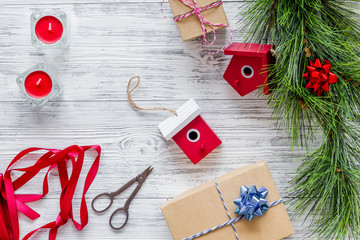 new year party preparation with gifts wrapping in boxes on wooden background top veiw space for text