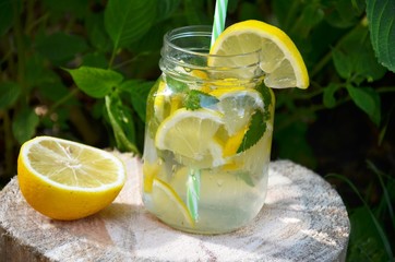 Lemon mojito cocktail with mint lemonade, cold refreshing drink or beverage, ice