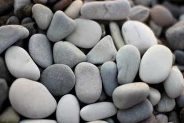 stones on the beach, grey stones, many stones