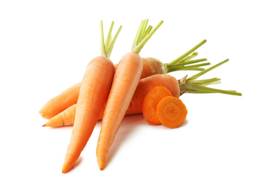 Fresh and ripe carrots isolated on white