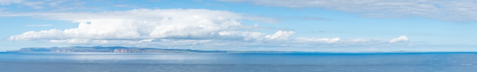 Fototapeta na wymiar Orkney Islands as seen from Dunnet Head, the most northerly point of the mainland of Great Britain.