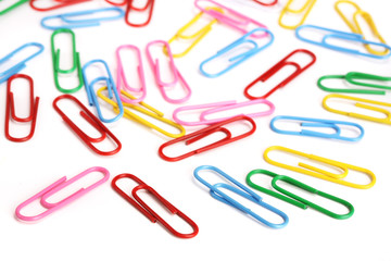 colorful paper clips isolated on white background