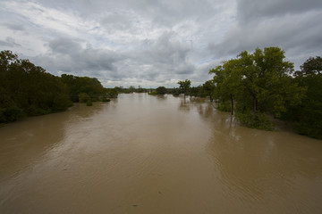 Wide shot of flooded Colorado River Bastrop Texas