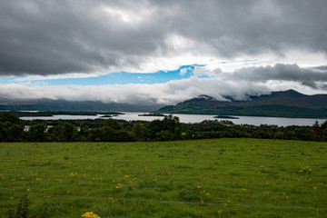 Mountains, Fields and Lake on Cloudy Day in Killarney Ireland