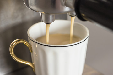 coffee machine with white cup fragment