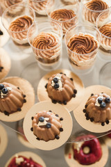 Different kinds of baked sweets on a buffet