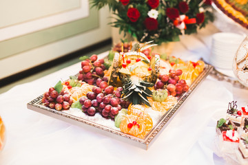 Different kinds of baked sweets on a buffet