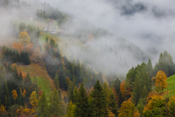 Colorful autumn landscape in the mountain village, morning in Dolimites