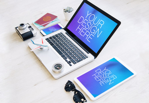 3 Devices with Passport and Travel Accessories Mockup 1