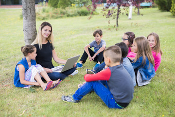 Fototapeta premium Great Portrait Of School Pupil Outside Classroom Carrying Bags