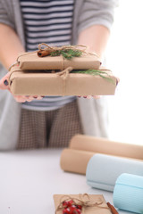 Hands of woman holding christmas gift box