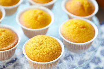 Closeup view of cake stand with Italian carrot muffins called Camilla, selective focus.