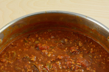 Close up of spaghetti sauce in large pot and made with ground turkey meat for lower cholesterol
