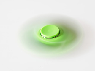 Fidget spinner, spinning isolated on white background, fast speed.