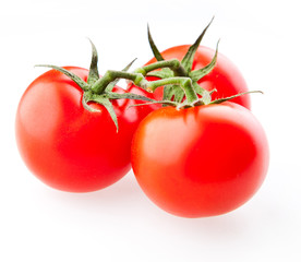 Tomatoes in  the studio on white