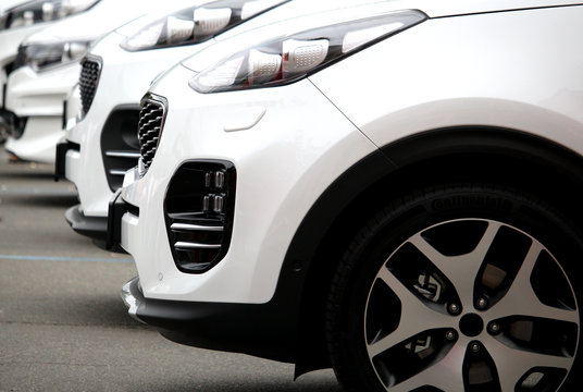 White Car Lined Up On The Asphalt Stock Photo