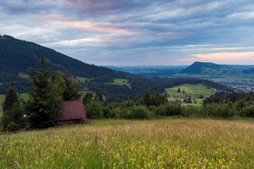 Bavarian Alps with mountain view and meadows in the Allgau