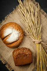 Homemade bread sourdough, rustic baked bread in wickerwork basket