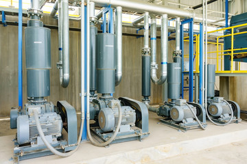 Wastewater treatment plant. A new pumping station. Valves and pipes. Urban modern treatment...