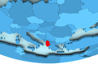 Albania in red on blue map