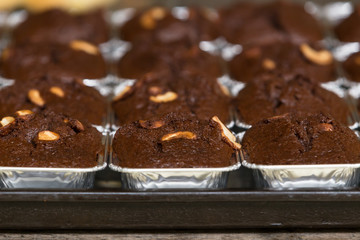 Thai bakery method baking chocolate brownie cake in pan