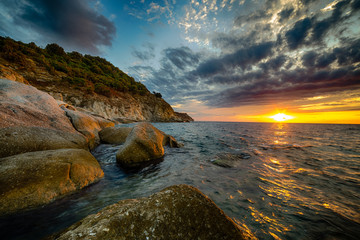 Scenic coastal sunset on island of Elba in Tuscany